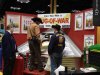 Conference attendees using the tug of war exhibit