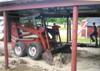 students paving farm building