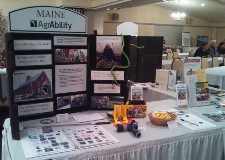 The Maine AgrAbility table at the Maine annual Farm Bureau meeting.