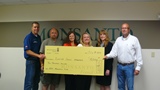 Monsanto check to NE Easter Seals for AgrAbility