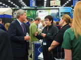 Secretary of Agriculture Tom Vilsack with Cindy Chastain at FAA Convention