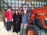 ME AgrAbility client Stan Haynes showing MPBN's Jennifer Mitchell the Clay Hill Farm