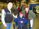 Tom Youngkman with VT AgrAbility client & grandson at VT Farm Show