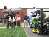 Two 1890s attendees on Life Essentials lifts