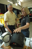 Karen Funkenbusch displaying grain mask