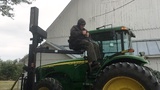 OH farmer with tractor lift