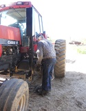 Michigan farmer using standing lift to access tractor