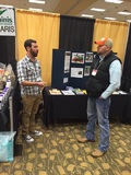 Shon Bishop talking with potential client at Great Plains Growers Conference