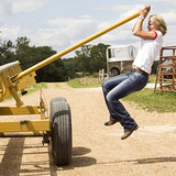 Carey Portell hanging from trailer