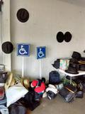 Photo of accessible parking signs and Amish hats