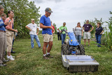 Don Craig & wife, Loretta showing two-wheel tractor