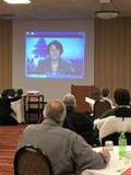 Senator Amy Klobuchar, MN, on screen at Fenceline Conference
