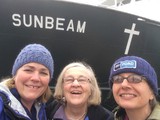 Lani Carlson and others with boat "Sunbeam"