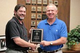 Don McGough on right accepting award from Dr. Glen Rains