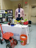 Kristoff at NC AgrAbility booth - Minority Farmers and Land Owners Conference