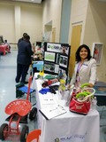 Betty Rodriguez at NC AgrAbility booth - Minority Farmers and Land Owners Conference