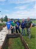 Stuart Home workers with raised bed