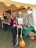 Kelly Smith with illustrative skeleton