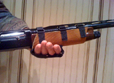 Photo of man holding rifle with Shot-Strap Rifle Holder