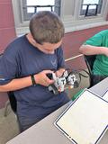 Big Spring Middle School student working on robotic technology