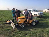 Tatanka Ki Owetu staff with new garden tractor and implements
