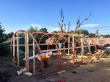 Hoop house started using repurposed materials
