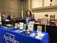 Abbie Spackman in PA AgrAbility booth at  PFB Statewide Meeting