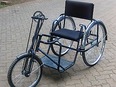 Low-cost leveraged wheelchair