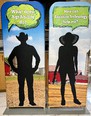 2 stand-up banners with the silhouette of a man in a cowboy hat on the left asking What does AgrAbility do - and a woman in a straw hat on the right asking How can Assistive Technology help me