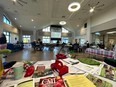 Picture of a large from behind an AgrAbility exhibit showing many other exhibitor tables.