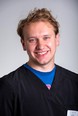 Portrait of a young man - Ethan Deyhle - smiling at the camera