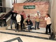 CO AgrAbility team clowning around with anamtronic bull T-Bone at AgrAbility NTW