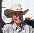 Picture of woman - Teresa Duffek - in Stetson hat smiling at the camera