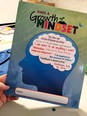 Front of a Clown College folder saying HAVE A GROWTH MINDSET