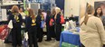 A group of FFA members around the AgrAbility booth