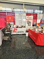 AgrAbility of WI booth at World Dairy Expo using 2 banners & 2 tables