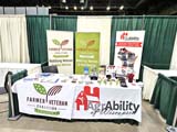 WI AgrAbility and Wisconsin Farmers Veteran Coalition booth at the Marbleseed Organic Farming Conference