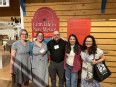 4 women and 1 man in the center representing the Western Regional Agricultural Stress Assistance Partnership at the AgrAbility NTW