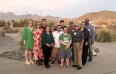 12 people from TN posed outside of the NM Farm & Ranch Heritage Museum during the 2025 AgrAbility NTW