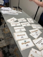 Table with cards on it - each card with a word like NATURAL-ORGANIC-NON-GMO-NUTRITION etc.