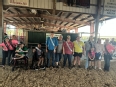 Group picture of people in the show ring at a fair.