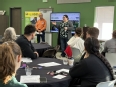 Huntington University faculty and Chuck Baldwin sharing in front of a classroom filled with OTs at AT Expo