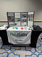 FishAbility display table with handouts and information for the public.